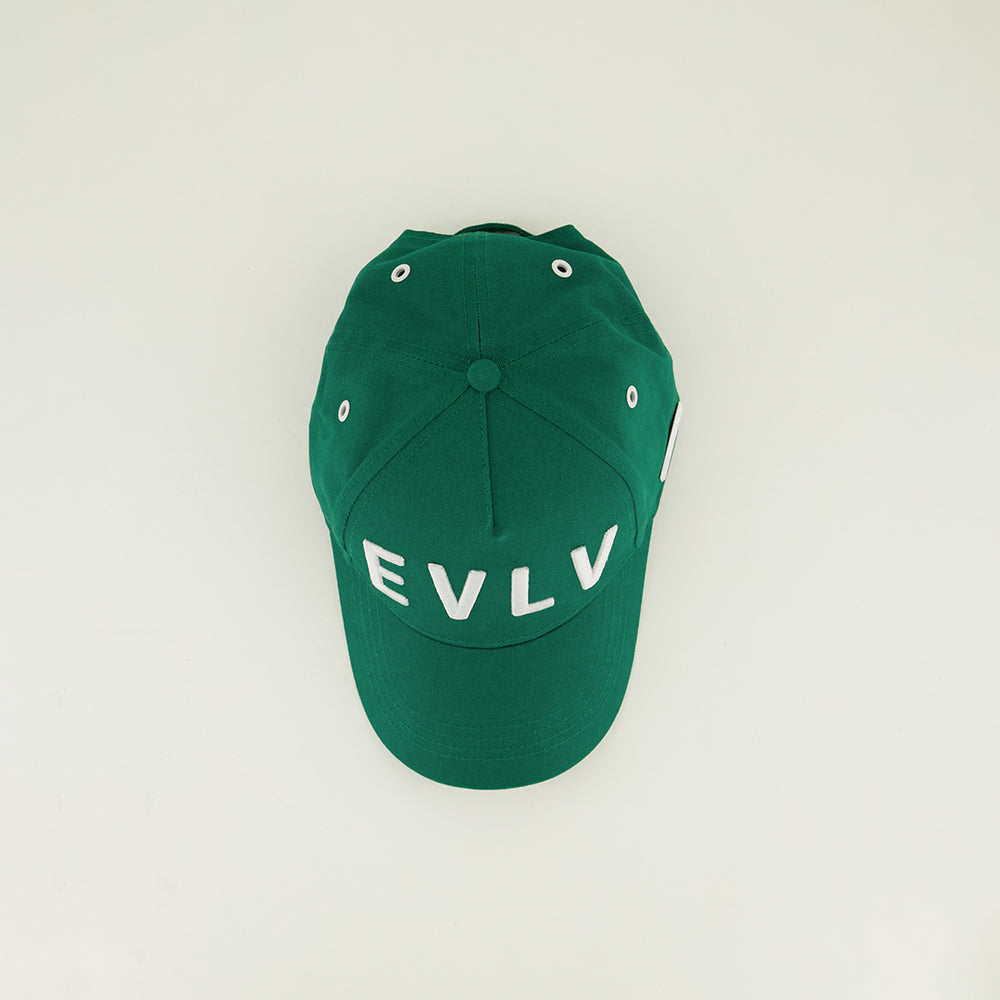 Evolve Green Peak Cap.White EVLV Embroidery And Trims.